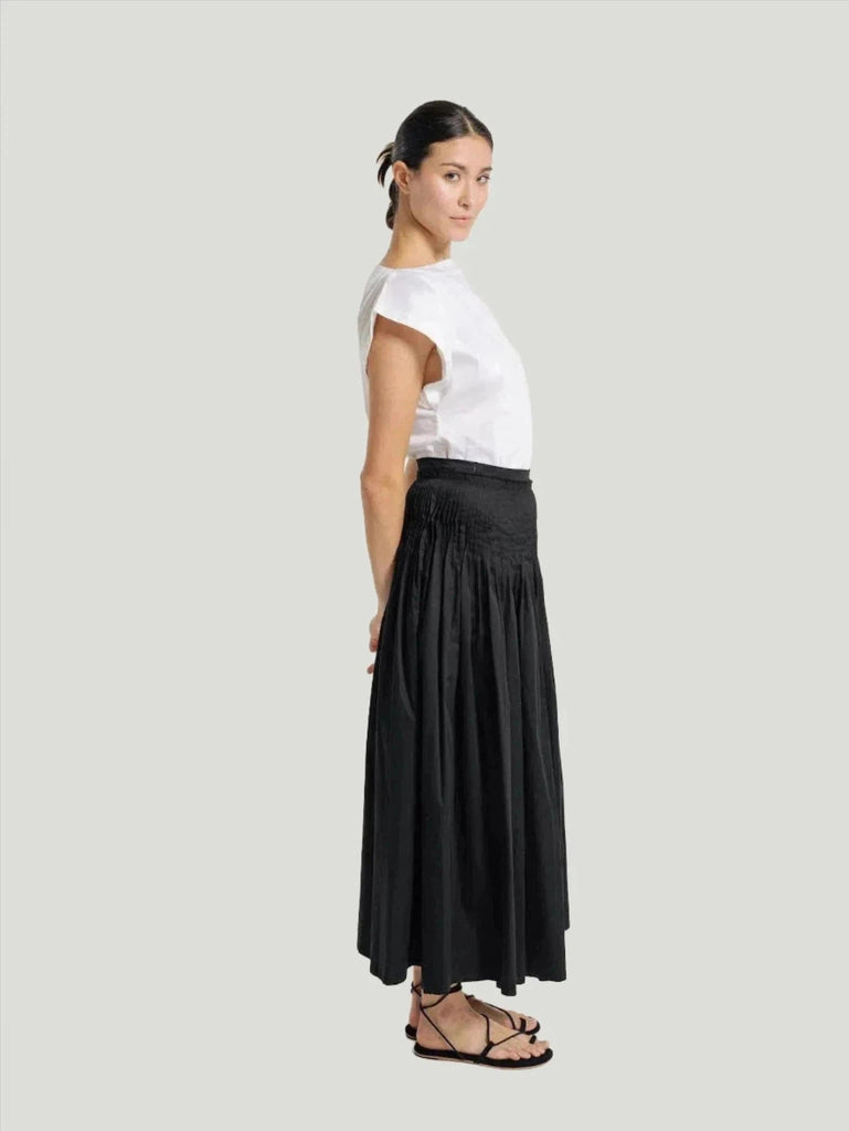 LAUDE the Label Drop Waist Pleated Skirt